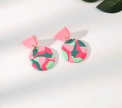 colorful round earrings on the white background