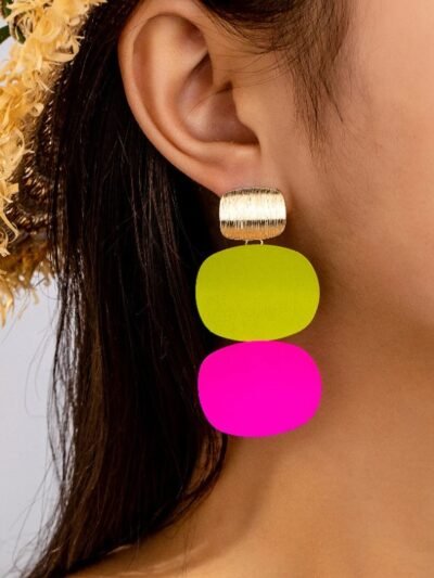 woman wearing colorful summer earrings and a flower crown