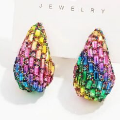 colorful watedrop earrings haning from a white paper package