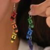woman wearing fun colorful earrings