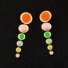 long colorful earrings on the black background