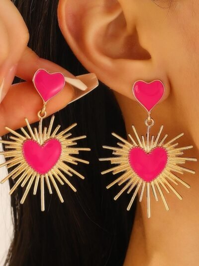 woman wearing pink earrings