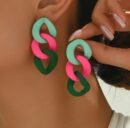 woman wearing vintage colorful earrings