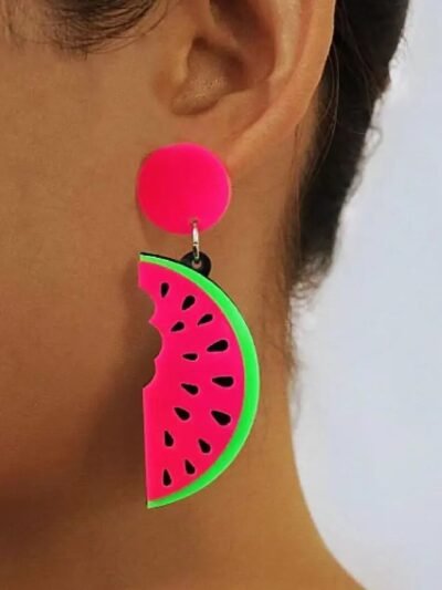 woman wearing watermelon earrings
