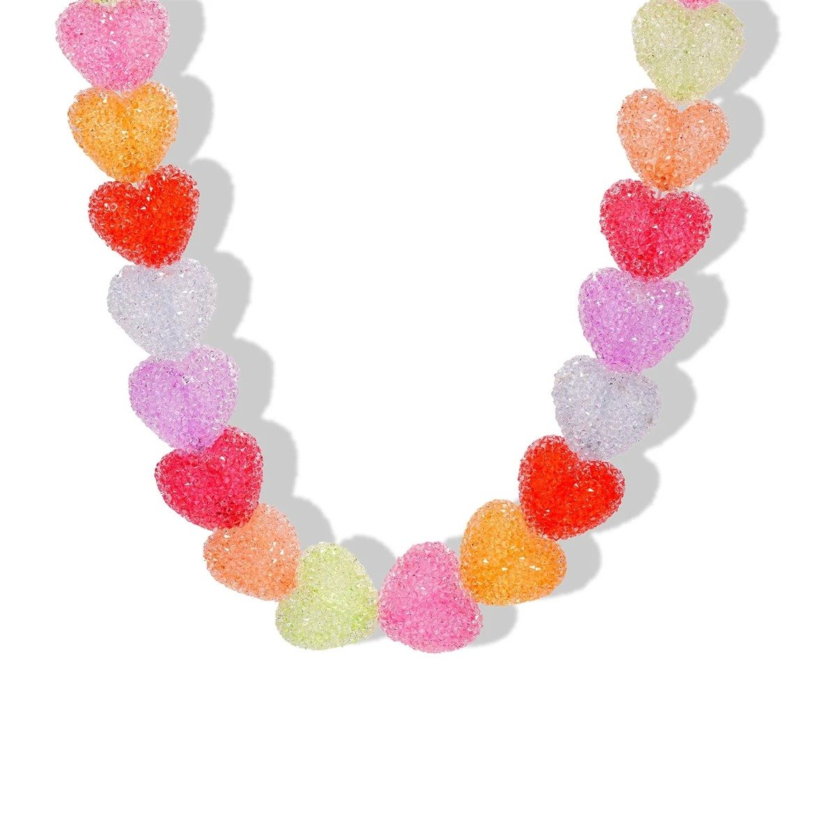 zoomed in beads of colorful candy necklace on the white background