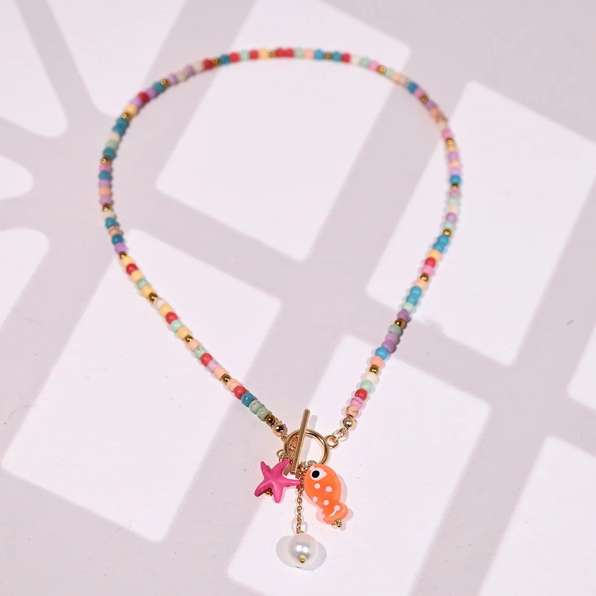 colorful sea-inspired necklace on the white background