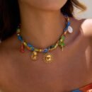woman wearing colorful scarf necklace